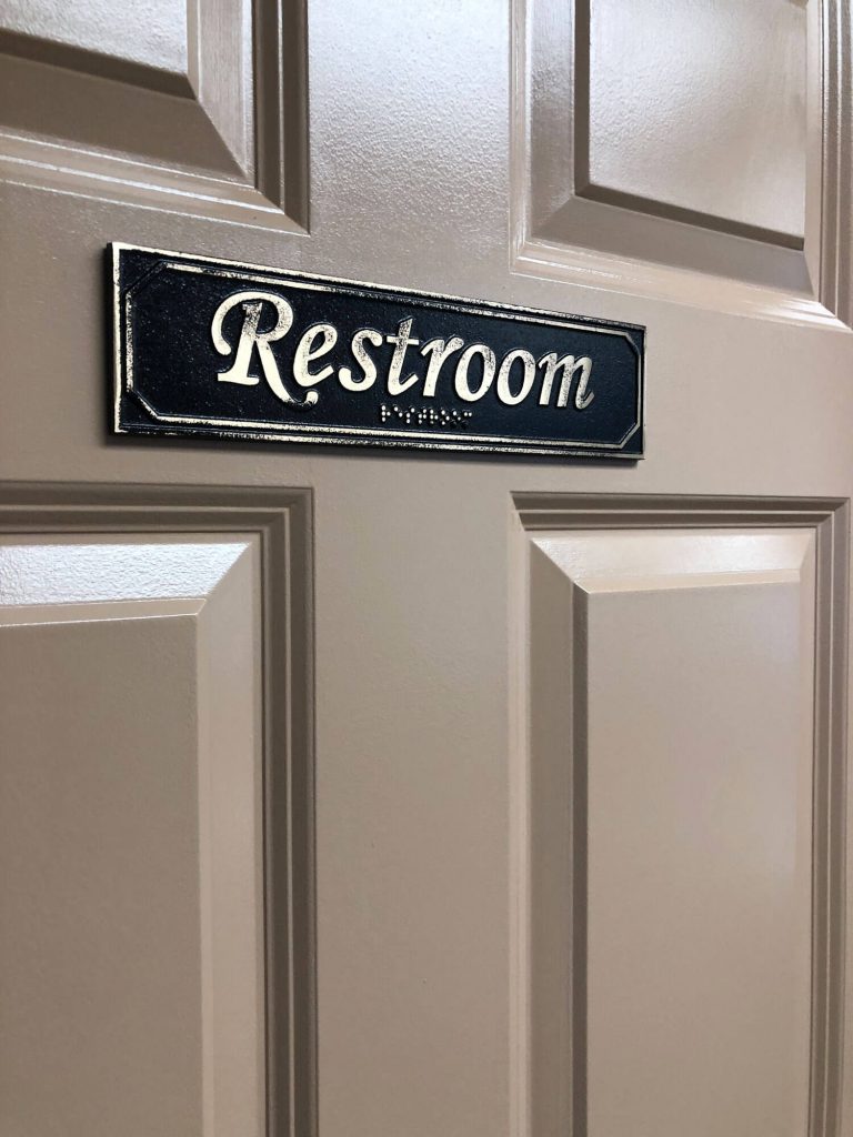 Brass Antiqued Restroom Door Sign with Braille 9 5/8